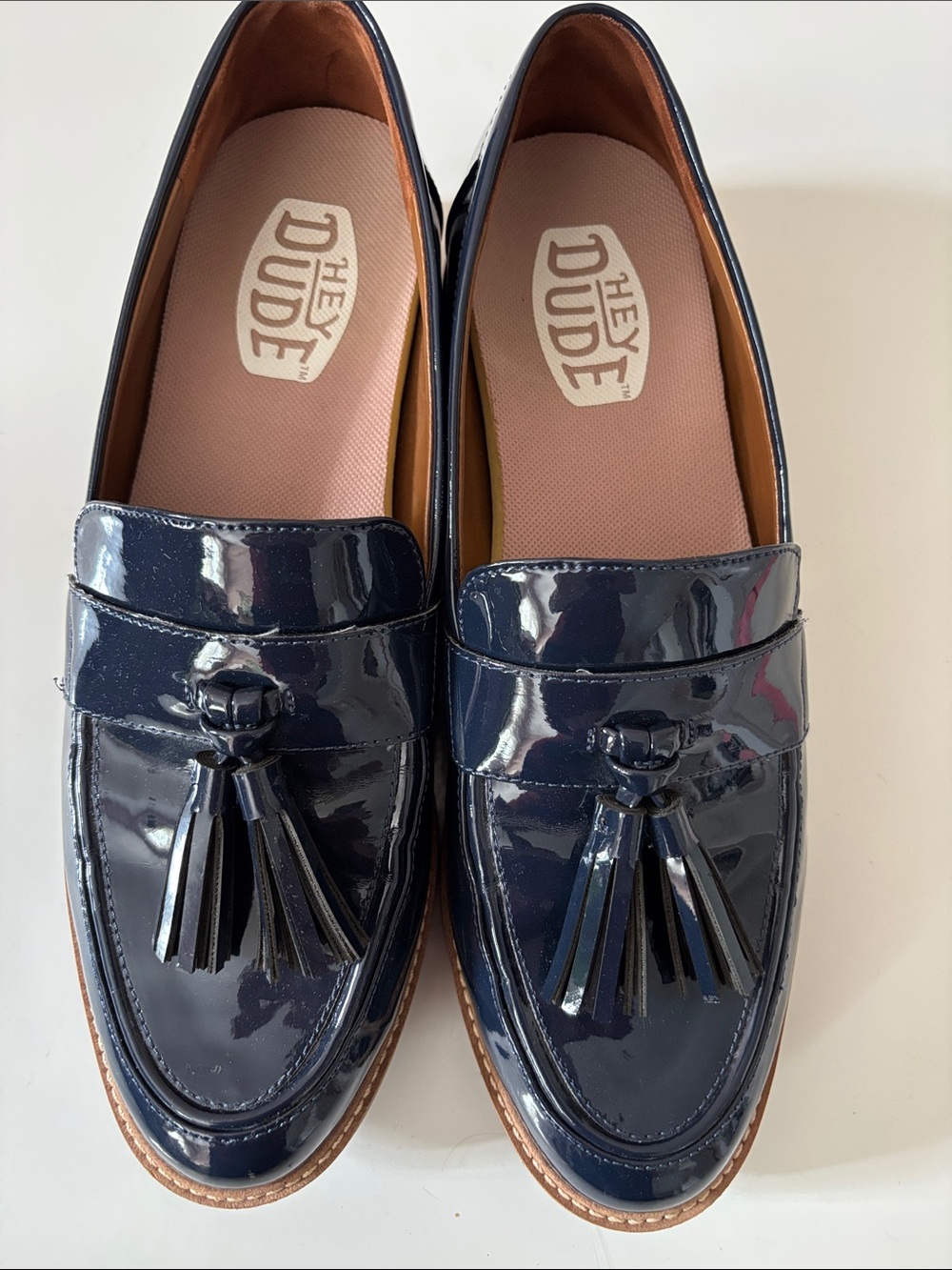 Franco Sarto Hey Dude women's Navy Patent Tassel Slip-Ons
